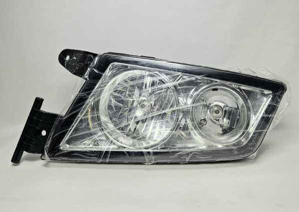 Фара передняя левая самосвала в сборе SITRAK 812W25101-6001 Sinotruk — 1