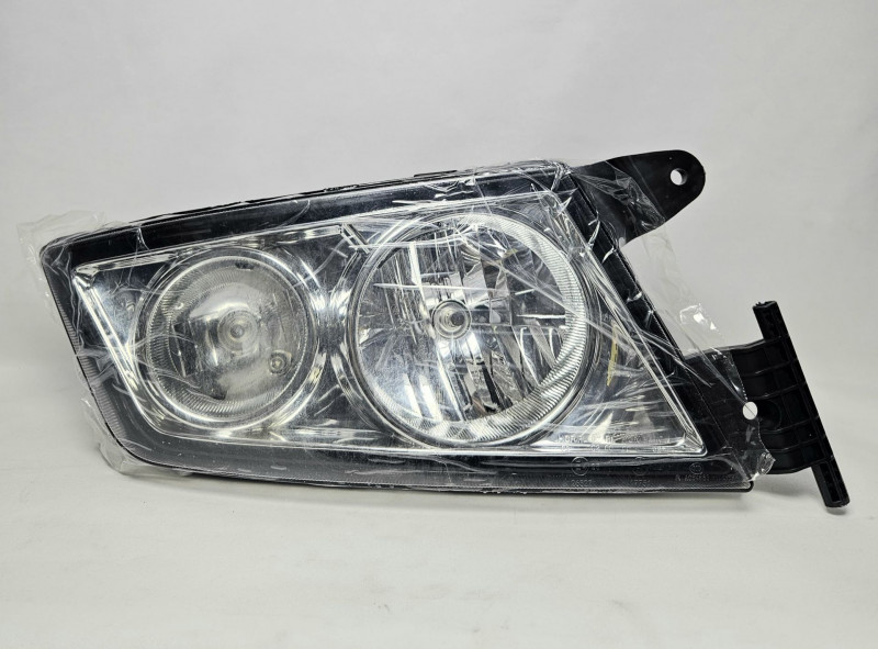 Фара передняя правая самосвала в сборе SITRAK 812W25101-6002 Sinotruk — 1