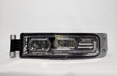 Фара противотуманная левая HOWO 811W25320-6003 Sinotruk